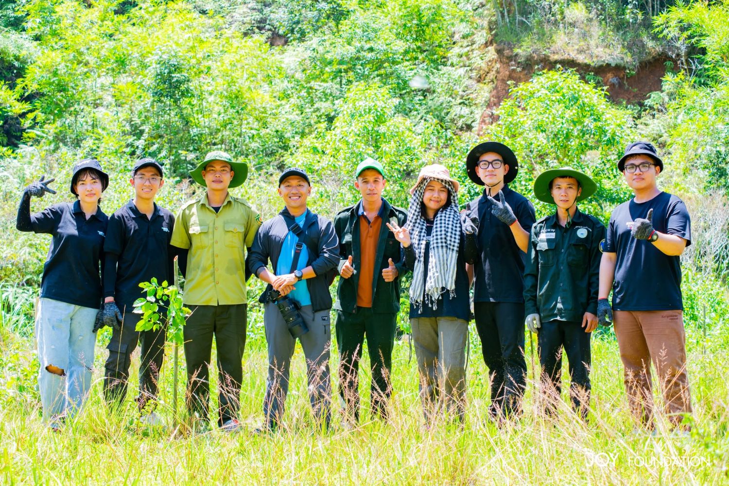 Post-A-Tree team and forest rangers after planting